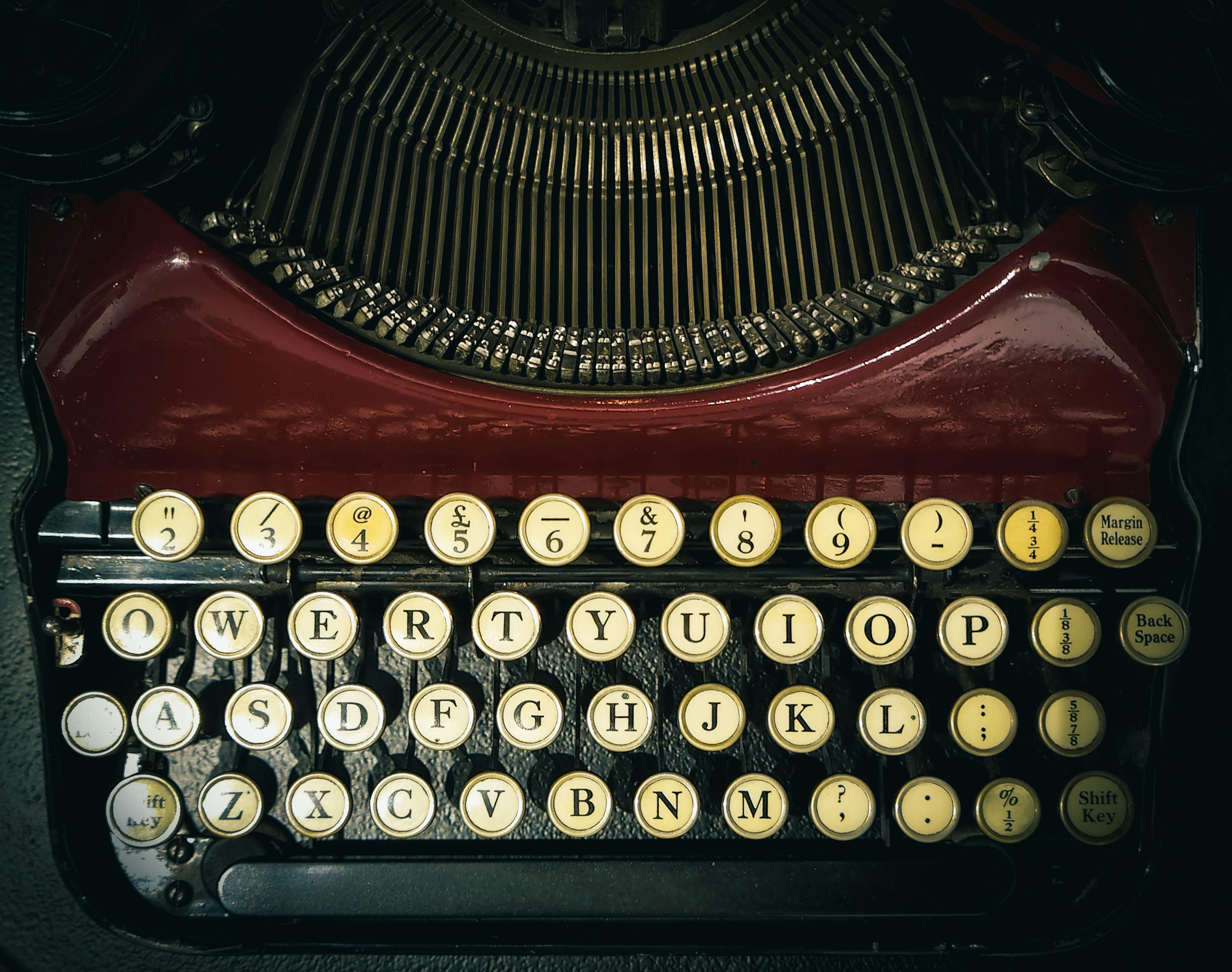 Up close view of a typewriter focusing on the keys